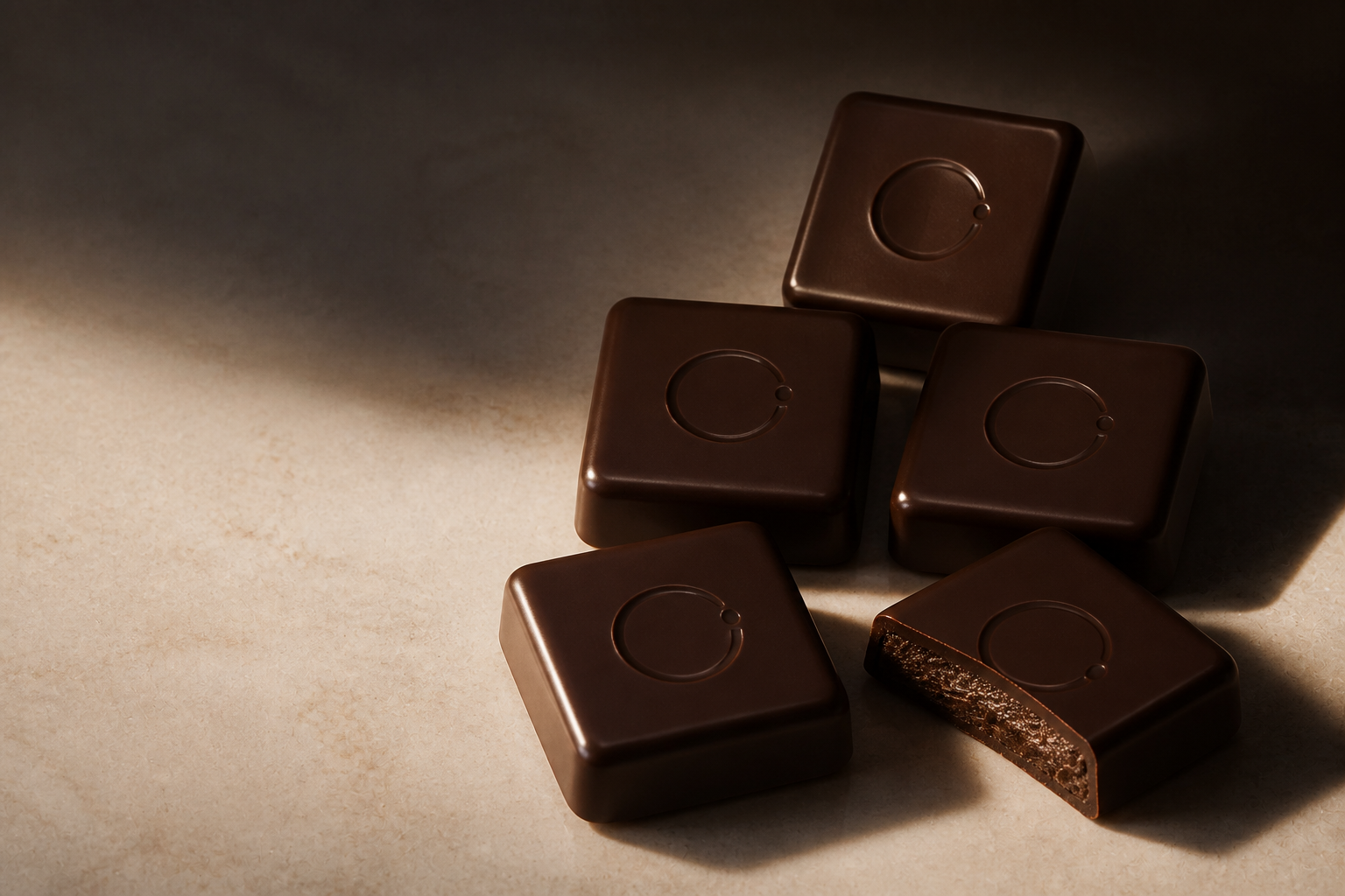 Embossed Chocturnal chocolate squares in warm evening light